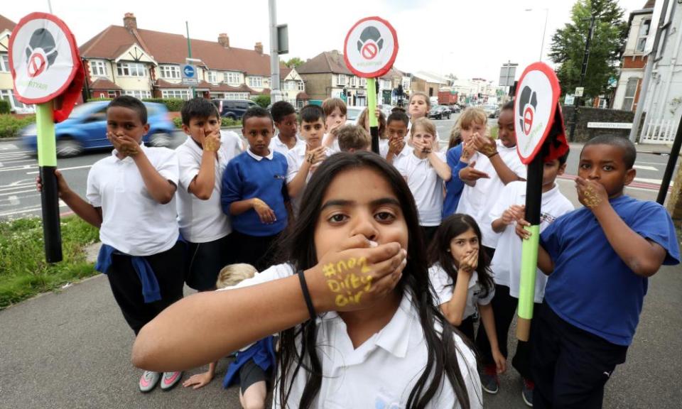 Primary school pupils in north London take part in the ‘Say No to Dirty Air’ campaign outside their school.