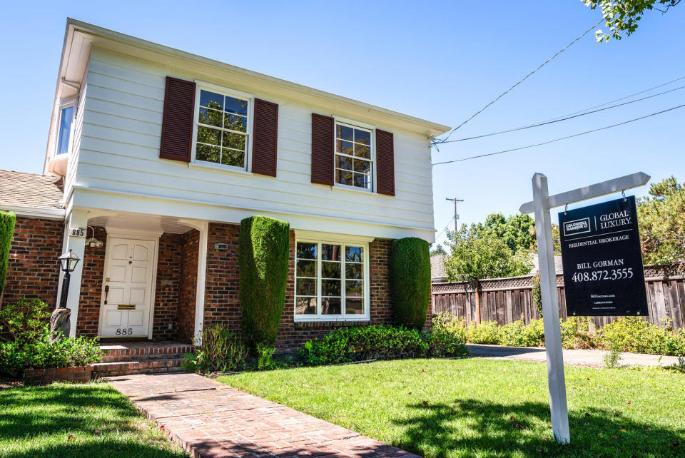 Image: A home advertised for sale in a residential neighborhood  (Loren Elliott / Getty Images)