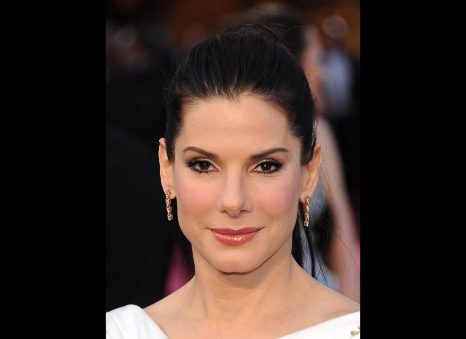 HOLLYWOOD, CA - FEBRUARY 26:  Actress Sandra Bullock arrives at the 84th Annual Academy Awards at the Hollywood and Highland Center on February 26, 2012 in Hollywood, California.  (Photo by Michael Buckner/Getty Images)