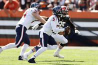 Houston Texans quarterback Tyrod Taylor (5) rushes for a 15-yard touchdown during the first half of an NFL football game against the Cleveland Browns, Sunday, Sept. 19, 2021, in Cleveland. (AP Photo/Ron Schwane)