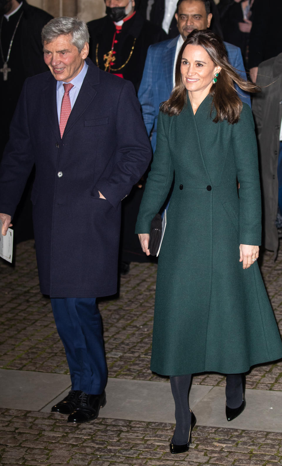 Pippa Middleton wearing a long green coat and a pair of patent leather pumps at the ‘Together At Christmas’ carol service at Westminster Abbey in London. - Credit: John Rainford / SplashNews.com