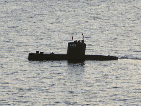 The home-made submarine "UC3 Nautilus", built by Danish inventor Peter Madsen, who is charged with killing Swedish journalist Kim Wall in his submarine, sails in the harbour of Copenhagen, Denmark, August 10, 2017. Picture taken August 10, 2017. REUTERS/Peter Thompson