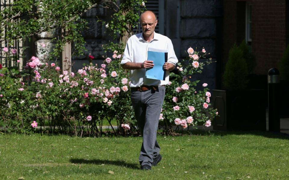 Dominic Cummings, senior aide to the Prime Minister, arrives at a press conference in May amid fury about a trip to Durham during lockdown - Jonathan Brady