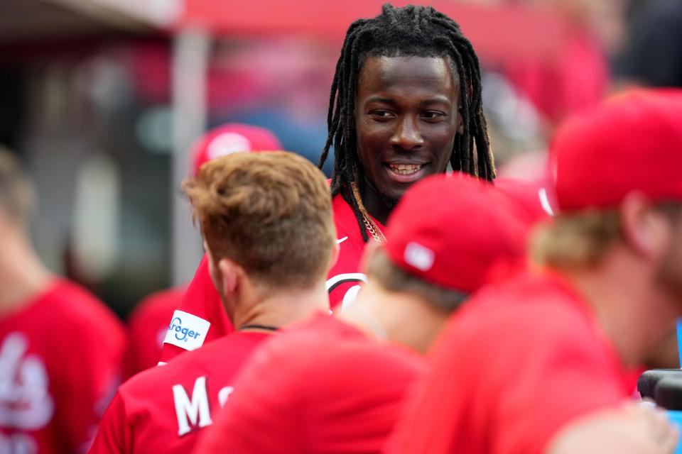 Cincinnati Reds shortstop Elly De La Cruz (44) smiles as he returns to the dugout after hitting a two-run home run in the first inning of a baseball game between the Los Angeles Dodgers and the Cincinnati Reds, Wednesday, June 7, 2023, at Great American Ball Park in Cincinnati. The home run was the first of his major-league career.