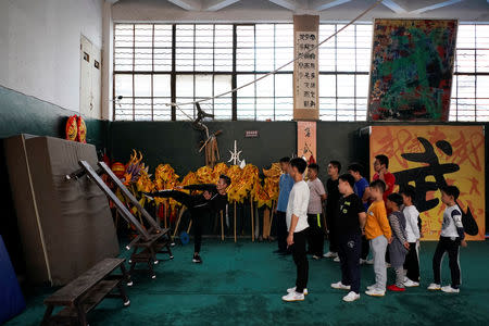 Students train at the Haihua Kung-fu School in Jiaxing, Zhejiang province, China October 27, 2018. REUTERS/Aly Song