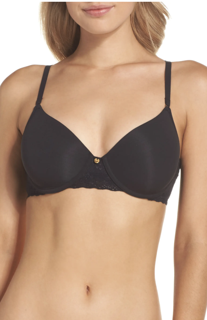 white model with blonde hair wearing Natori Bliss Perfection Underwire Contour Bra in Black and naked stomach