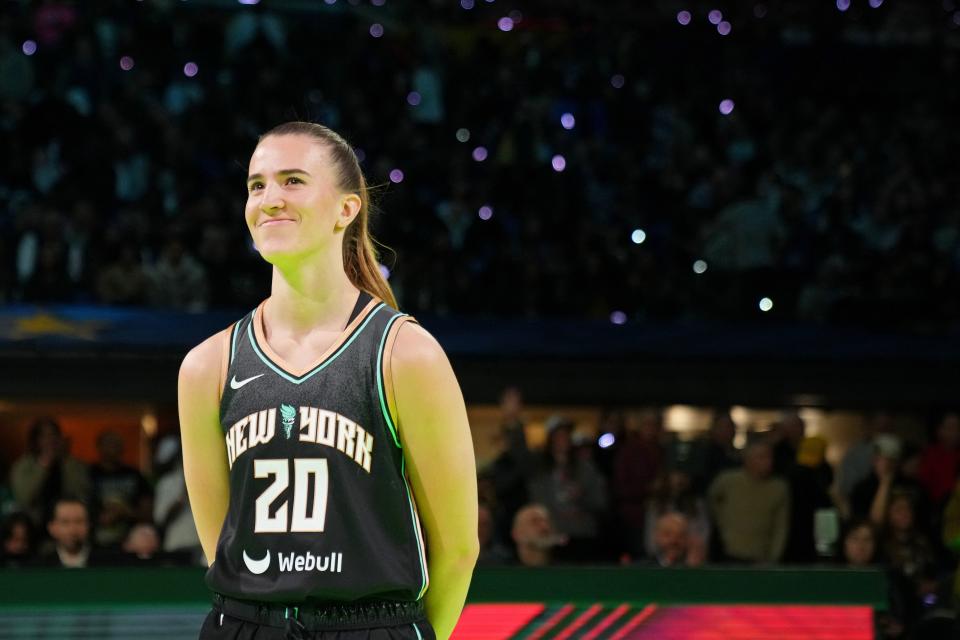New York Liberty guard Sabrina Ionescu (20) reacts after the Stephen vs Sebrina three-point challenge during NBA All Star Saturday Night at Lucas Oil Stadium.