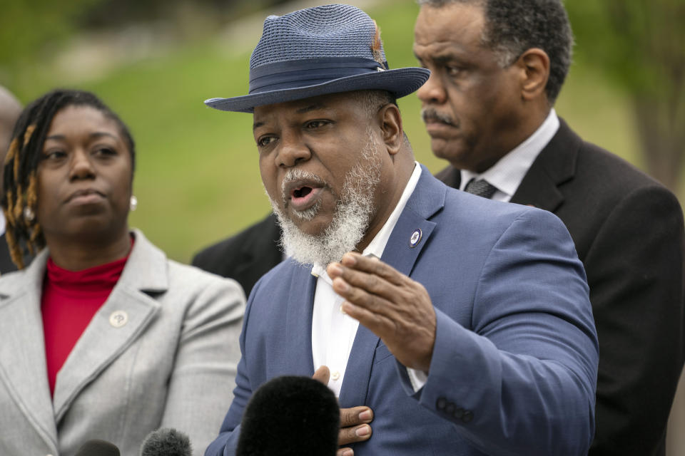 State Rep. Antonio Parkinson, D-Memphis, of the Tennessee Black Caucus of State Legislators responds to questions during a press conference outside the state Capitol, Friday, April 7, 2023, in Nashville, Tenn. the day after two of its members were expelled from the state's House of Representatives. (AP Photo/George Walker IV)