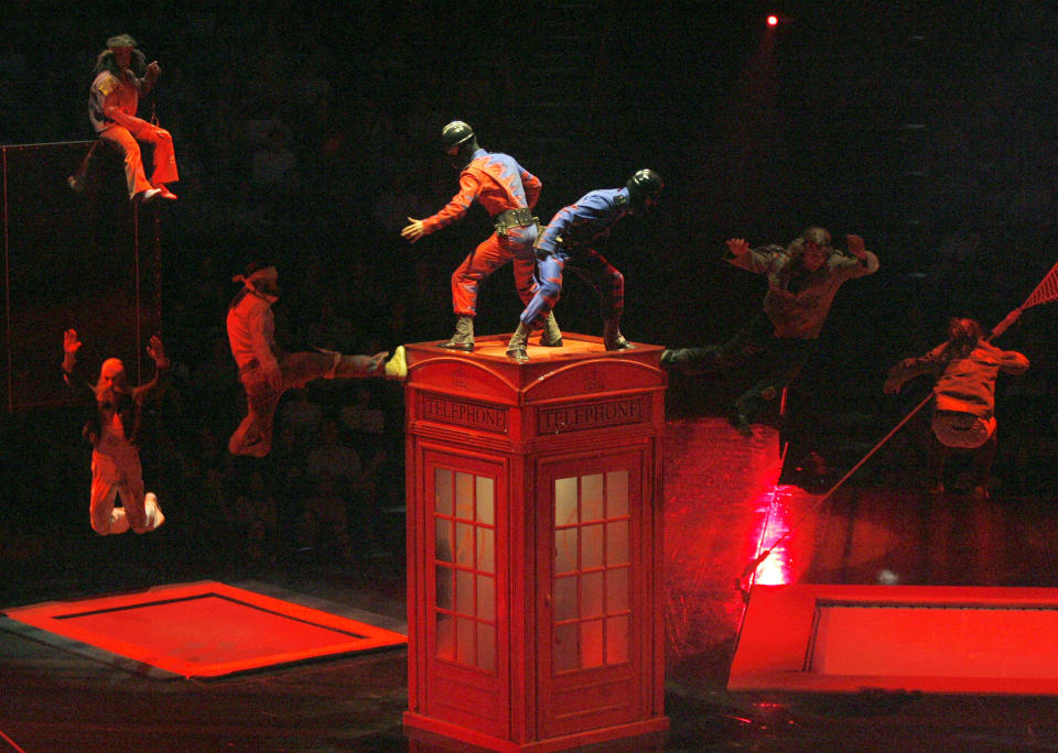 FILE - Acrobats perform during the preview of "Love," a new Beatles-themed Cirque du Soleil show, in Las Vegas, June 27, 2006. On Tuesday, April 9, 2024, it was announced that the final curtain will come down July 7 on Cirque du Soleil's long-running show “The Beatles Love," a cultural icon on the Las Vegas Strip that brought band members Paul McCartney and Ringo Starr back together for public appearances throughout its 18-year run. (AP Photo/Jae C. Hong, File)