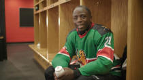 Kenya Ice Lions team captain Benard Azegere poses for a photograph in the locker room following his squad's first game in Toronto, Ontario, Canada, in this still image handout photo taken from video August 14, 2018 and provided October 16, 2018. Tim Horton's/Handout via REUTERS