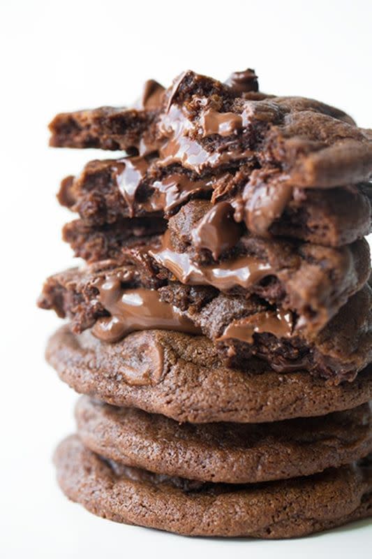 <p>Cooking Classy</p><p>Double chocolate cookies with a molten Nutella center. </p><p><strong>Get the recipe: <a href="https://www.cookingclassy.com/chocolate-chocolate-chip-cookies/" rel="nofollow noopener" target="_blank" data-ylk="slk:Nutella Stuffed Chocolate Chip Cookies;elm:context_link;itc:0;sec:content-canvas" class="link ">Nutella Stuffed Chocolate Chip Cookies</a></strong></p><p><strong>Related: <a href="https://parade.com/844933/manuzangara/17-drool-worthy-nutella-recipes/" rel="nofollow noopener" target="_blank" data-ylk="slk:17 Drool-Worthy Nutella Recipes;elm:context_link;itc:0;sec:content-canvas" class="link ">17 Drool-Worthy Nutella Recipes</a></strong></p>