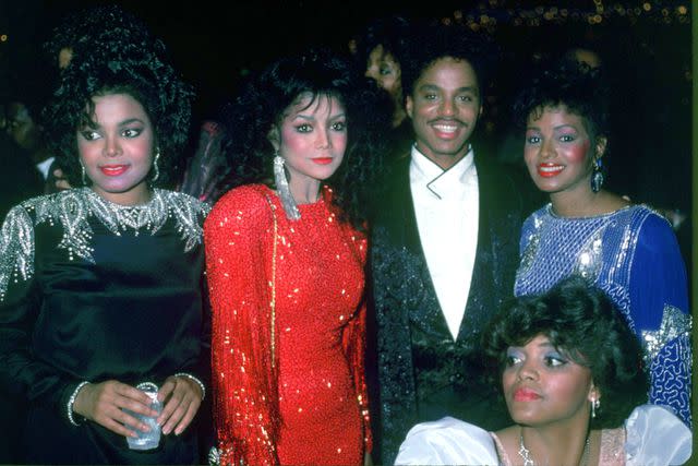 <p>Michael Ochs Archives/Getty</p> Janet Jackson (left) with siblings LaToya, Marlon and Rebbie Jackson in 1986