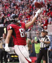 Atlanta Falcons tight end Austin Hooper (81) celebrates his touchdown against the Tampa Bay Buccaneers during the first half of an NFL football game, Sunday, Oct. 14, 2018, in Atlanta. (AP Photo/John Bazemore)