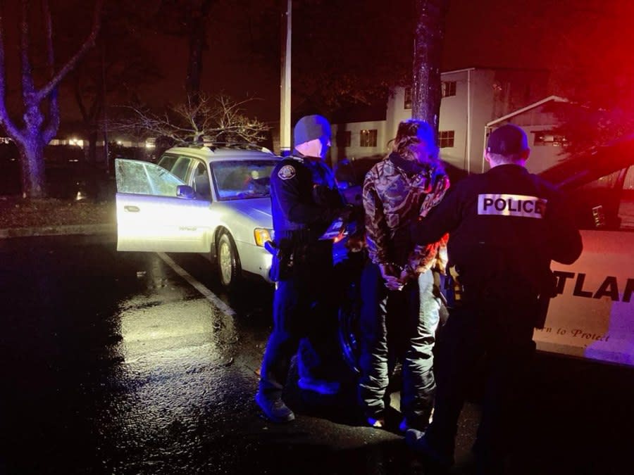 A suspect in handcuffs being interviewed by officers during an SVO conducted on Jan. 26, 2024 (Courtesy: PPB)