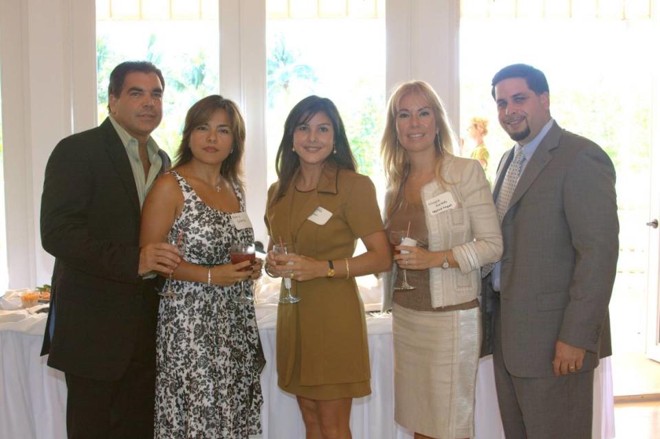 A photo filed in federal court shows the executives of American Therapeutic Corp. in Miami in 2009. From left: Lawrence Durán, Marinella Valera, Judith Negrón, Margarita Acevedo and José Valdés.