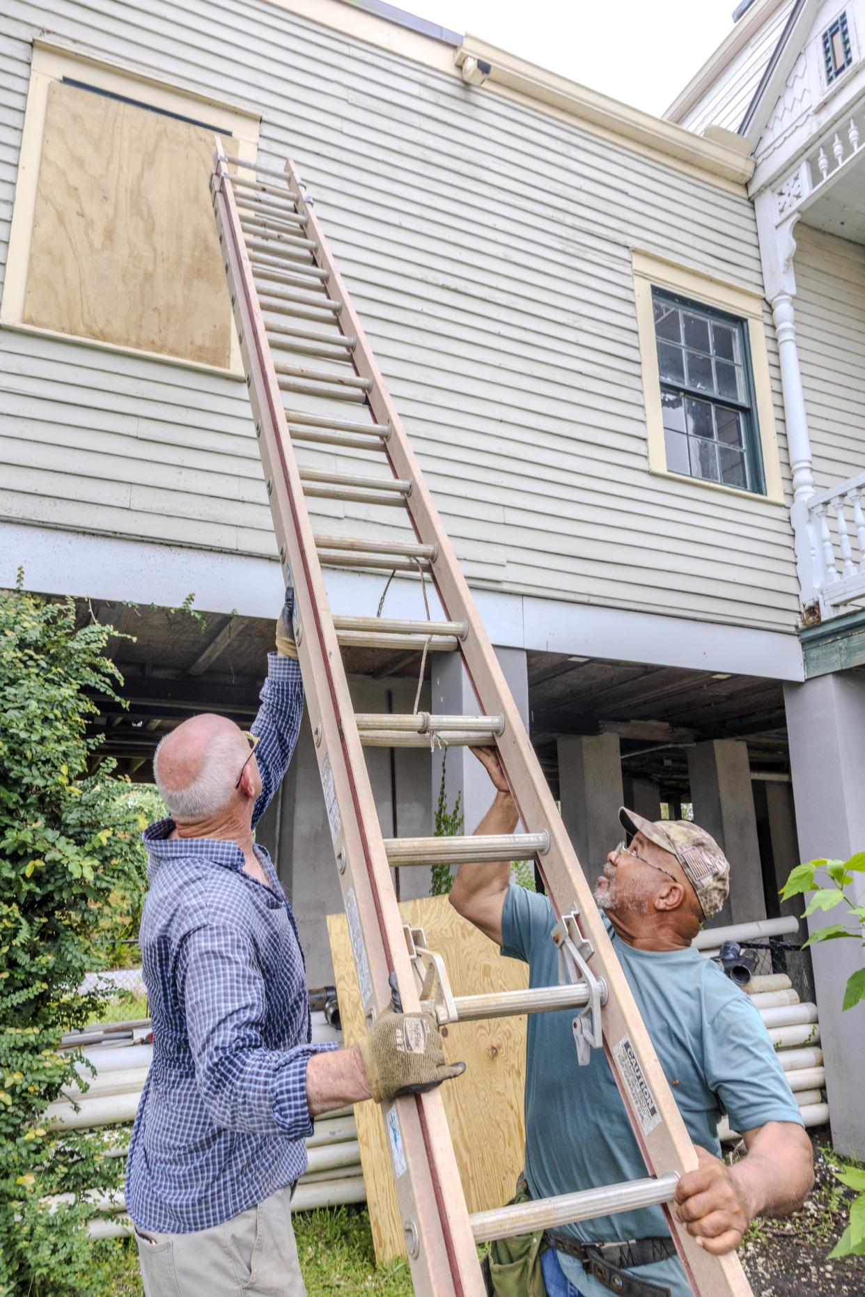 The windows of a raised historic house are boarded up as residents prepare for the arrival of Hurricane Francine along the Louisiana coast on Monday, Sept. 9, 2024, in Lafitte, La. (Chris Granger/The Times-Picayune/The New Orleans Advocate via AP)