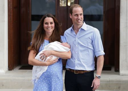 Britain's Prince William and his wife Catherine, Duchess of Cambridge appear with their baby son, outside the Lindo Wing of St Mary's Hospital, in central London in this file photograph dated July 23, 2013. REUTERS/Suzanne Plunkett/files