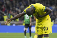 Inter Milan's Romelu Lukaku celebrates after scoring his side's fourth goal during the Serie A soccer match between Inter Milan and Sassuolo at the San Siro Stadium, in Milan, Italy, Saturday, May 13, 2023. (AP Photo/Antonio Calanni)