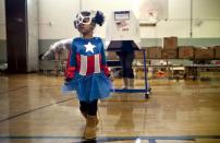 <p>Three-year-old Raena Lamont hung out at a donation center-turned-polling station in Staten Island in November 2012, just two weeks after Hurricane Sandy wreaked havoc on the area.</p>