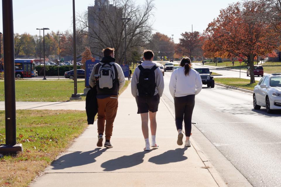 Experts say a better indicator to predict college success is grade point average in high school. The University of Kansas, shown here, cut the ACT test from admissions requirements.