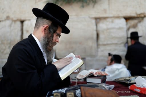 The ultra-Orthodox community known in Hebrew as haredi or God fearing represent about 10 percent of Israel's population. The majority of women are the wage earners in their families while the men spend their days studying holy texts