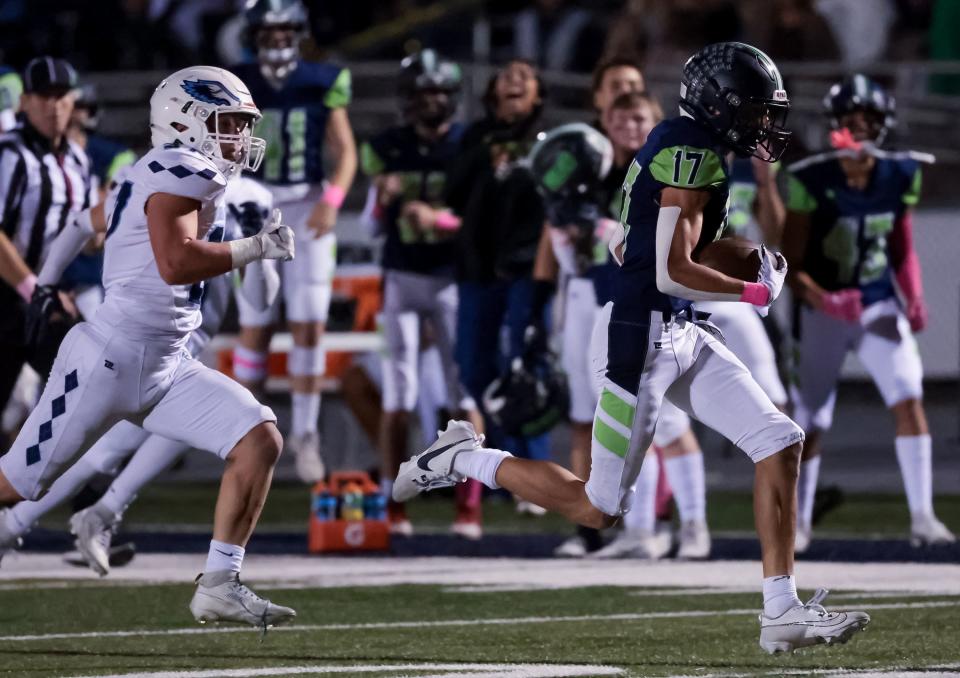 Timpanogos’ Gabe Graf runs the ball in for a touchdown in a high school football game against Salem Hills in Orem on Friday, Oct. 6, 2023. | Spenser Heaps, Deseret News