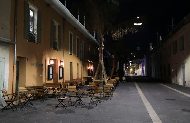 An empty street is seen, as France's Prime Minister announced to close most all non-indispensable locations, notably cafes, restaurants, cinemas, nightclubs and shops from midnight in Nice