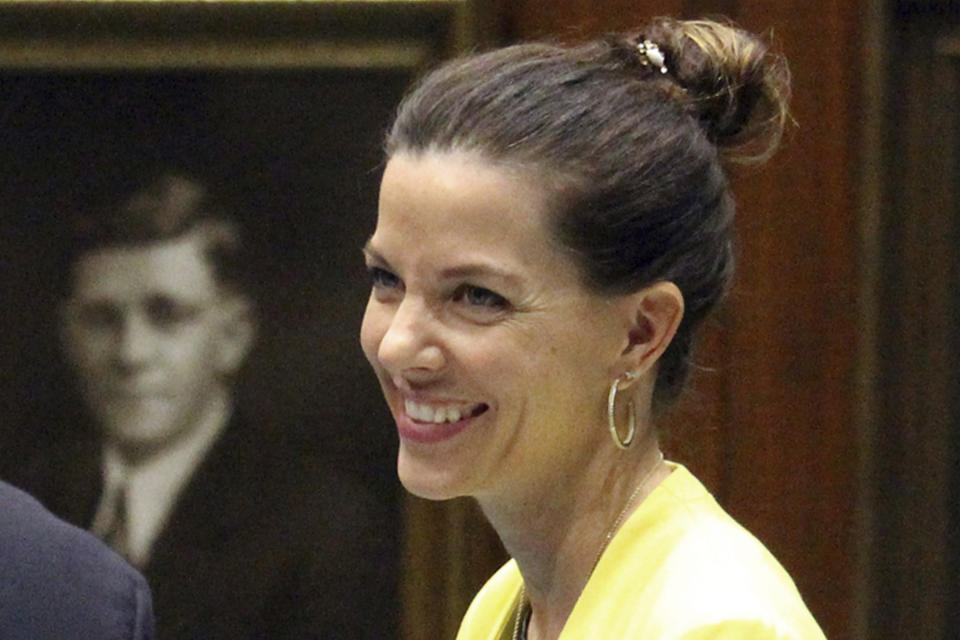 FILE - Then-Arizona state Rep. Michelle Ugenti-Rita, R-Scottsdale, smiles during a legislative session at the Capitol in Phoenix, Jan. 31, 2017. Ugenti-Rita is running for Arizona secretary of state. (AP Photo/Bob Christie, File)