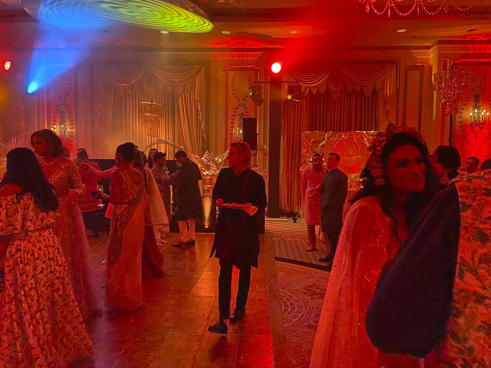 Vanity Fair editor Radhika Jones, second from left. Ronan Farrow, center, at a Diwali celebration at The Pierre hotel in New York on Saturday, Oct. 22, 2022. The annual party, now in its third year, is intended to highlight Diwali by bringing together high-powered South Asians with other New York luminaries. (AP Photo/Mallika Sen)