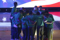 Boston Celtics huddle during the national anthem before an NBA basketball game against the Golden State Warriors in San Francisco, Tuesday, Feb. 2, 2021. (AP Photo/Jeff Chiu)