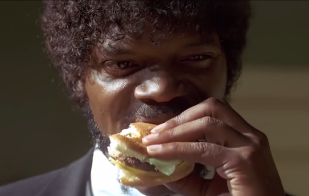 Jackson's character taking a bite of a burger