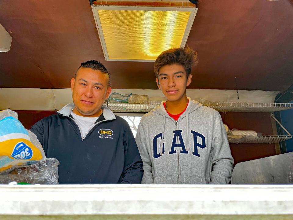 Juan Lozaea Sr. and Juan Lozaea Jr. bring Juan’s Taco Truck to Salon Matias to help owner Christina Matias-Arroyo celebrate 15 years of great business in the Karns community.