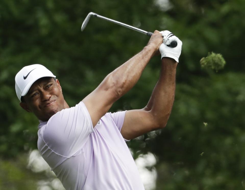 Tiger Woods hits from the fourth tee during the third round for the Masters golf tournament Saturday, April 13, 2019, in Augusta, Ga. (AP Photo/Chris Carlson)