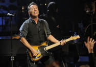 Bruce Springsteen and the E Street Band perform at the Apollo Theater on Friday, March 9, 2012 in New York. The concert was hosted by SiriusXM in celebration of 10 years of satellite radio. (AP Photo/Evan Agostini)