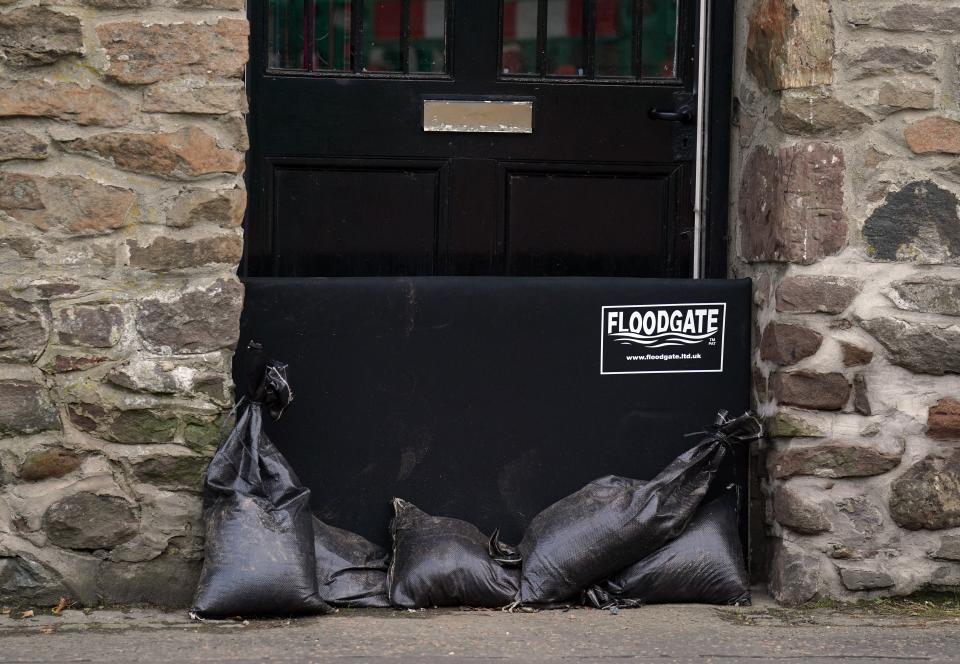 Sand bags sit in a doorway in Aberfoyle in Perthshire (Andrew Milligan/PA Wire)