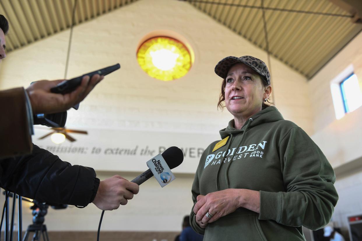 President and CEO of Golden Harvest Food Bank Amy Breitmann answers questions from the media during the second annual MLK Day of Service at The Master's Table on Monday, Jan. 15, 2024. Golden Harvest Food Bank prepared to serve about 300 lunches, in addition to medical screenings by Augusta University students, and showers through Project Refresh.