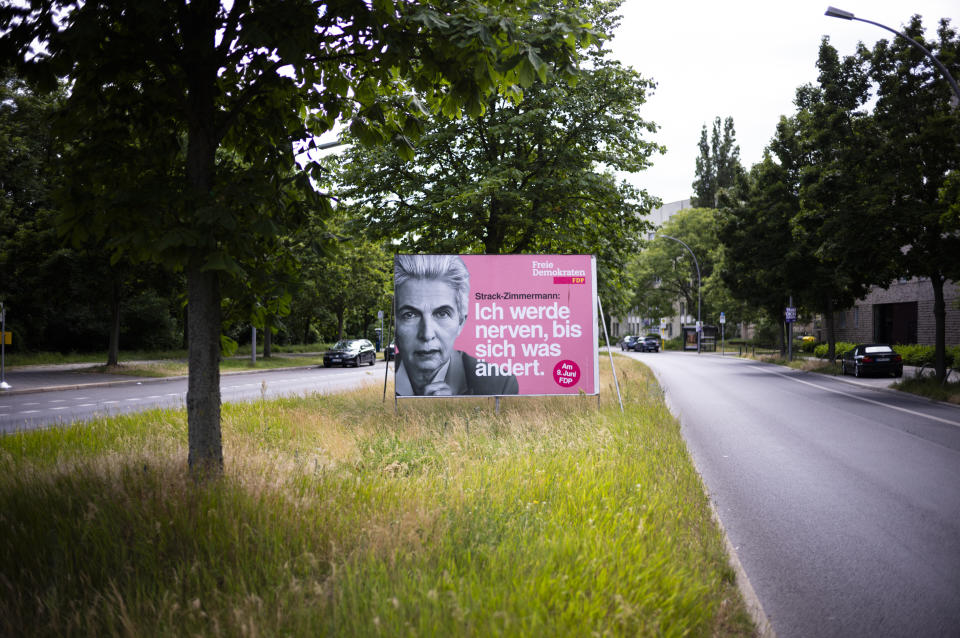 With a portrait of top candidate Marie-Agnes Strack-Zimmermann and the slogan 'I'll be annoying until something changes' the Germany" Free Democratic Party, FDP, campaigning for votes on an election poster for the European Election, in Berlin, Germany, Wednesday, May 29, 2024. The European elections will take place form June 6 to June 9. German politics are in a disgruntled, volatile state as the country's voters prepare to fill 96 of the 720 seats at the European Parliament on June 9, the biggest single national contingent in the 27-nation European Union. It's the first nationwide vote since center-left Chancellor Olaf Scholz took power in late 2021. (AP Photo/Markus Schreiber)