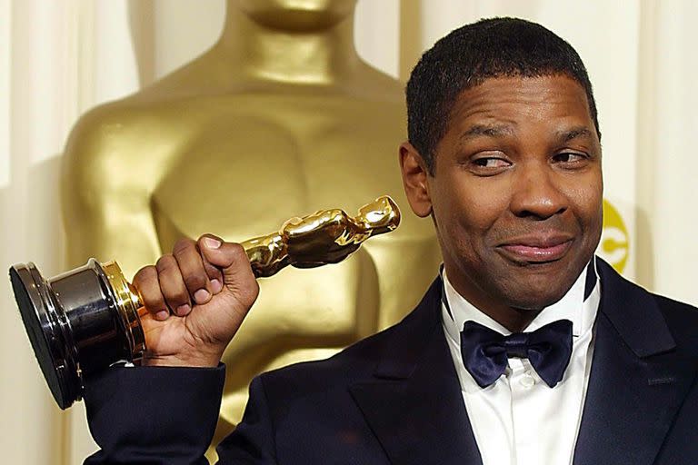 Denzel Washington es uno de los actores más reconocidos de Hollywood. Estuvo nominado durante la última entrega de los Oscar por su trabajo en la película MacBeth. (AFP PHOTO-Mike NELSON/)