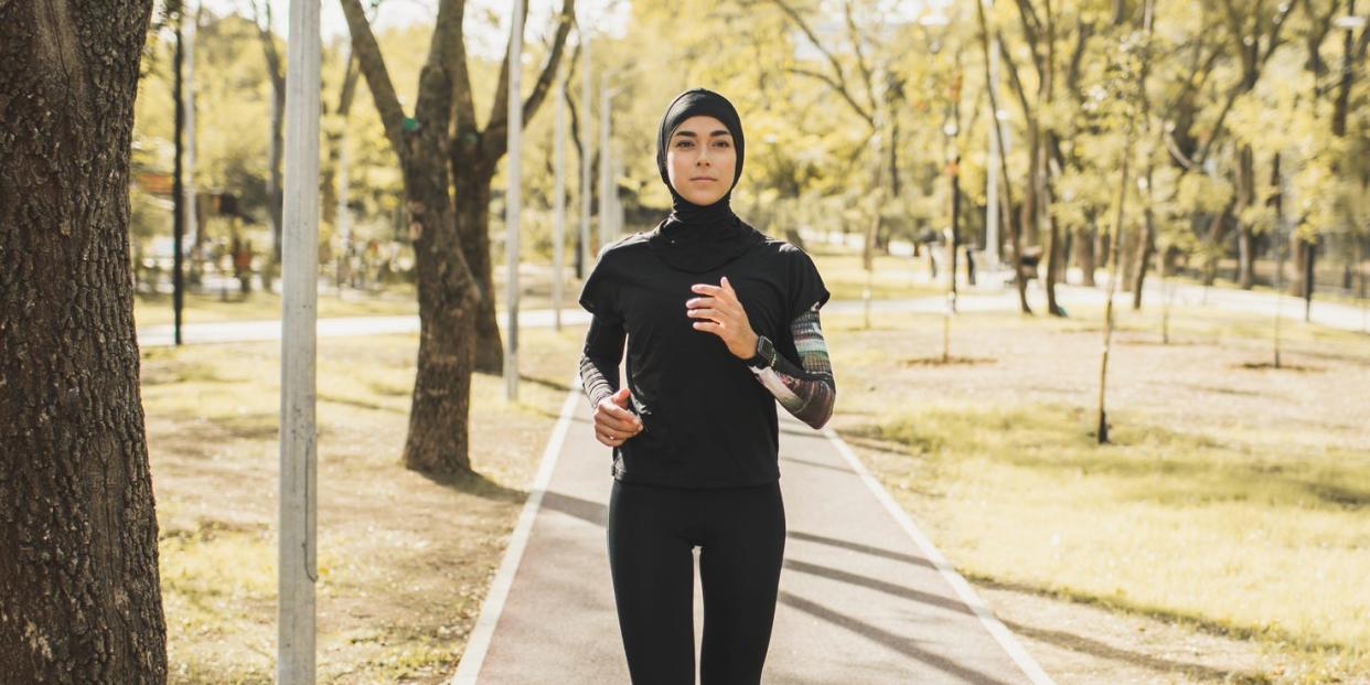 muslim woman running