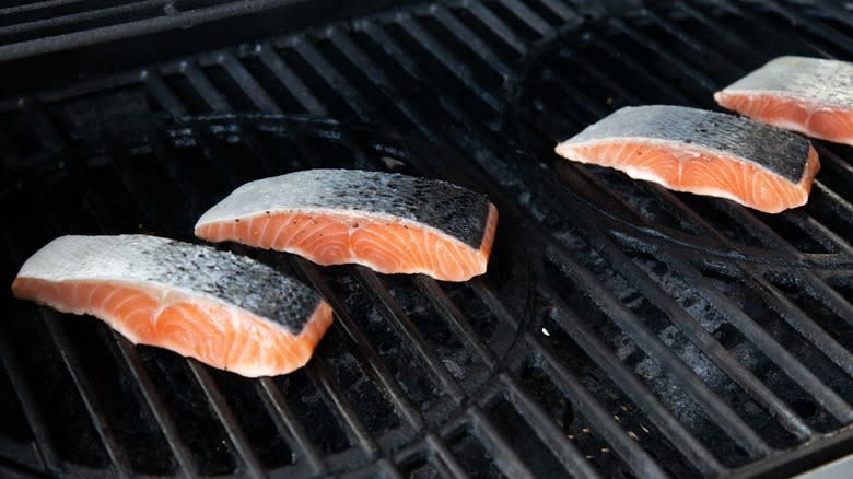 salmon pieces on gas grill