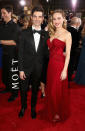 <p>A dapper Alex Greenwald walked the red carpet alongside fiancée Brie Larson, who stunned in a form-fitting red gown. </p>