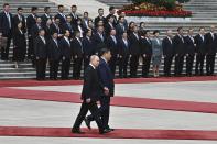 Chinese President Xi Jinping, center right, and Russian President Vladimir Putin walk during an official welcome ceremony in Beijing, China, on Thursday, May 16, 2024. (Sergei Bobylev, Sputnik, Kremlin Pool Photo via AP)