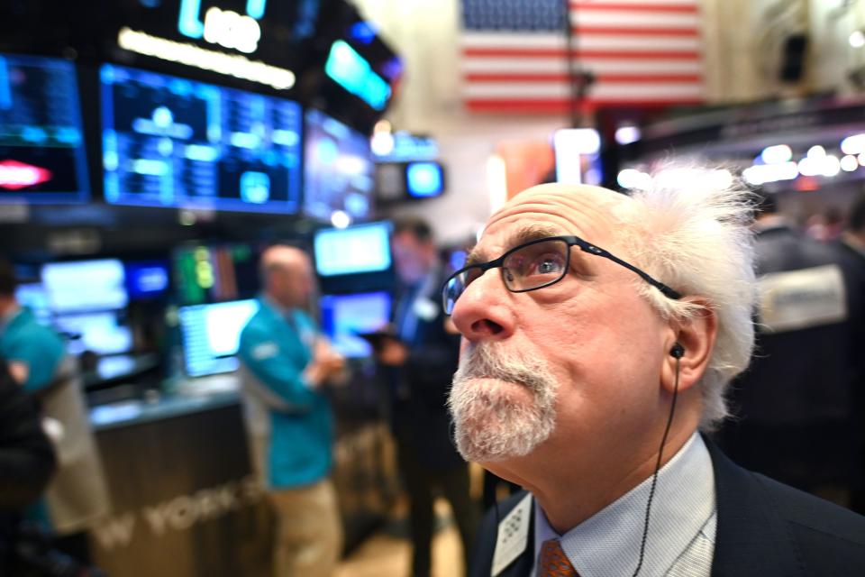 Traders work during the opening bell at the New York Stock Exchange (NYSE) on February 28, 2020 at Wall Street in New York City. - Losses on Wall Street deepened following a bruising open, as global markets were poised to conclude their worst week since 2008 with another rout. (Photo by Johannes EISELE / AFP) (Photo by JOHANNES EISELE/AFP via Getty Images)