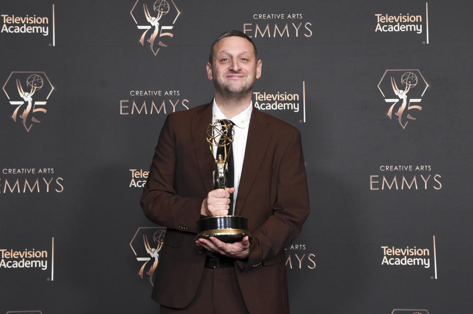 Tim Robinson poses with the award for outstanding actor in a short form comedy or drama series for "I Think You Should Leave With Tim Robinson" in the press room during night one of the Creative Arts Emmy Awards on Saturday, Jan. 6, 2024, at the Peacock Theater in Los Angeles. (Photo by Richard Shotwell/Invision/AP)