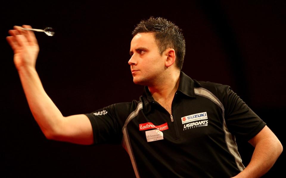 Steve Brown in action against James Wade  during the 2010 World Darts Championship at Alexandra Palace