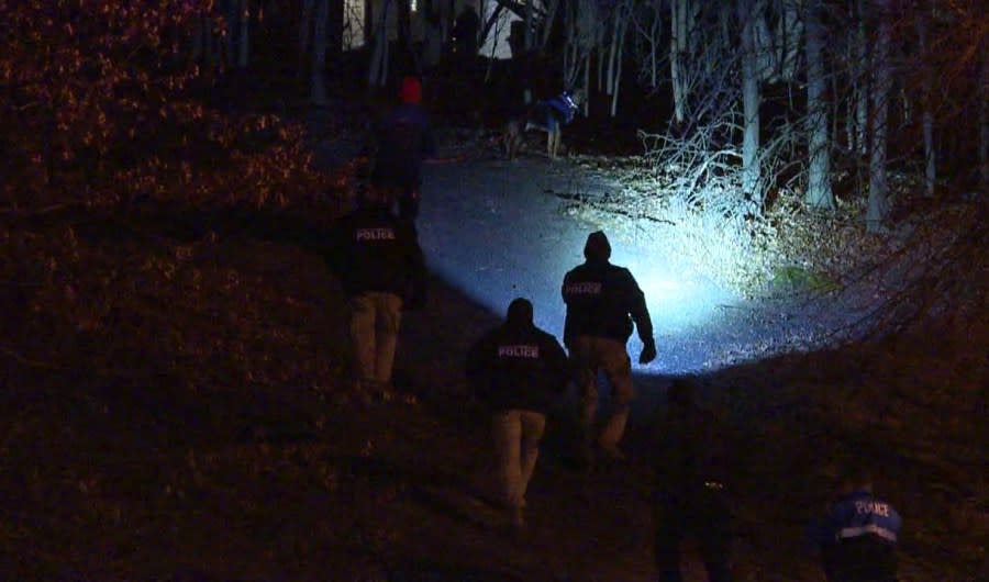 Cleveland police continue to search around a Brooklyn, Ohio apartment complex Wednesday night. (Courtesy/WJW Fox 8)