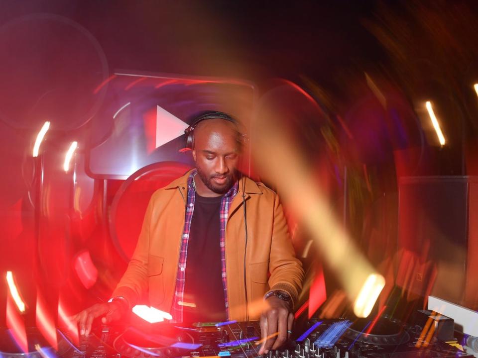 Virgil Abloh DJs on stage at the YouTube cocktail party during Paris Fashion Week2018 (Victor Boyko/Getty Images for YouTube)