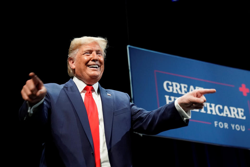 U.S. President Donald Trump points to guests during an event on Medicare at The Villages retirement community in The Villages, Florida, U.S., October 3, 2019. REUTERS/Kevin Lamarque