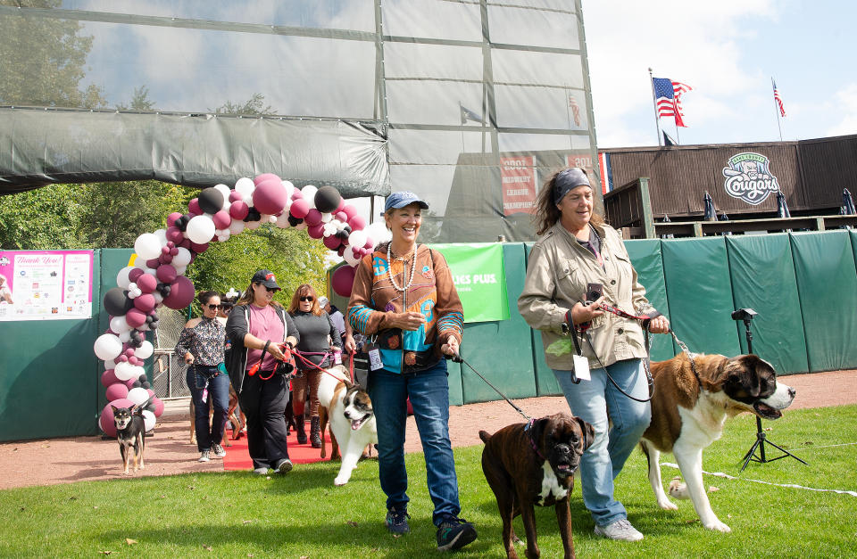 <p>Couples make their way onto the field for the official tally.</p>