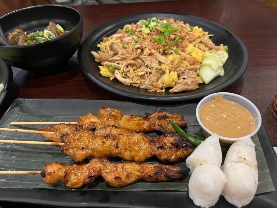 Nusa’s chicken satay, Nusa noodles and braised beef.